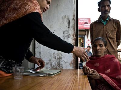 Woman receiving TB drugs