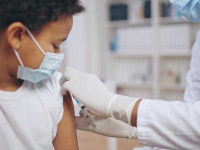 Boy getting vaccinated
