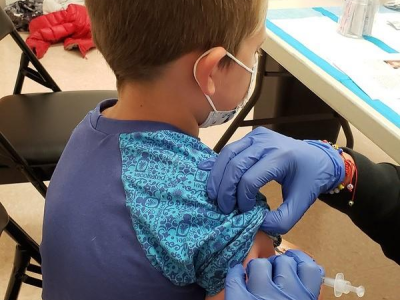 Boy getting vaccinated