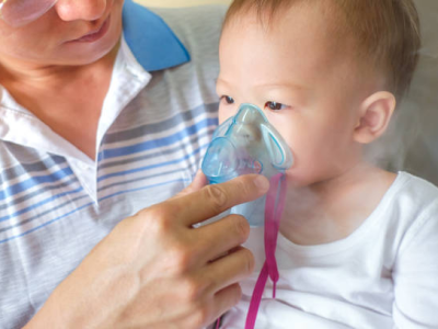 Boy with nebulizer