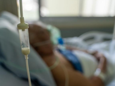 COVID patient in hospital with IV