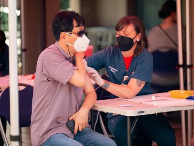 Man getting COVID-19 vaccine
