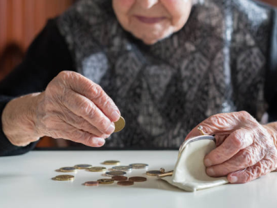 Woman counting coins