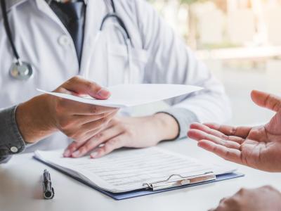 Doc giving patient prescription