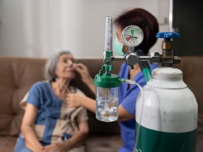 elderly woman getting oxygen