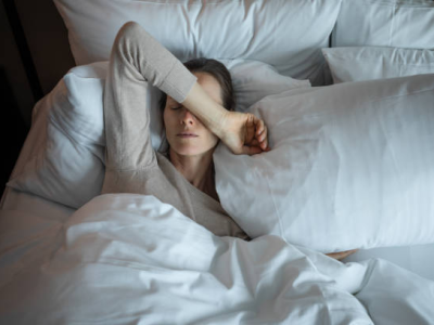 Woman lying in bed