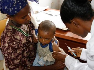 Boy receiving malaria vaccine