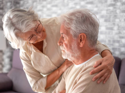 Wife comforting man with dementia