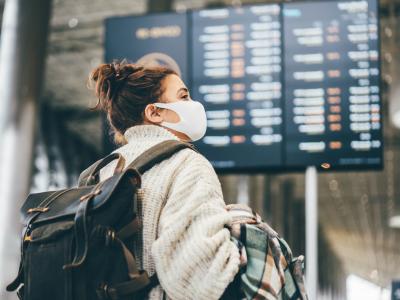 Masked air traveler