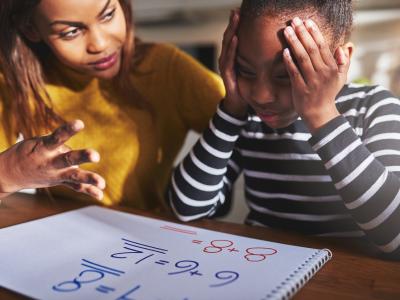 Mom working on math with son