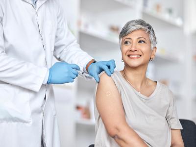 Older woman getting vaccinated