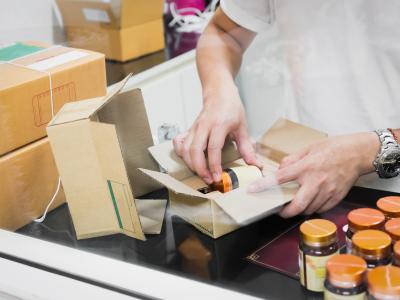 Packing medications into box