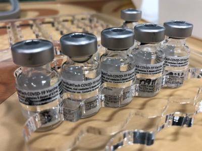 Row of Pfizer vaccine vials