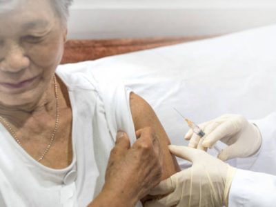 Woman receiving shingles vaccine