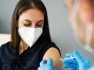 Woman getting vaccinated
