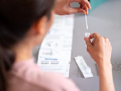 Woman taking rapid test