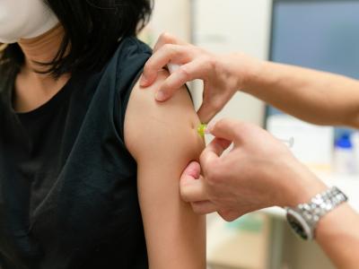 Woman getting booster shot