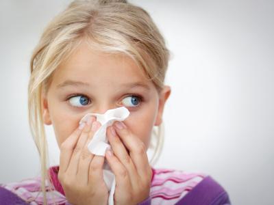 Child blowing nose