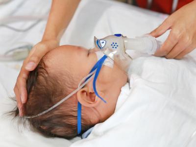 baby being nebulized