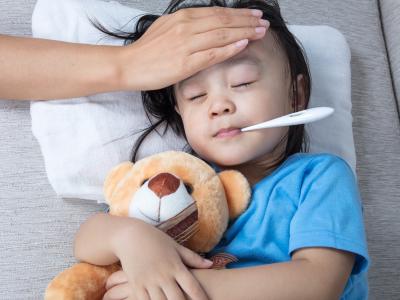 Young Asian girl with fever