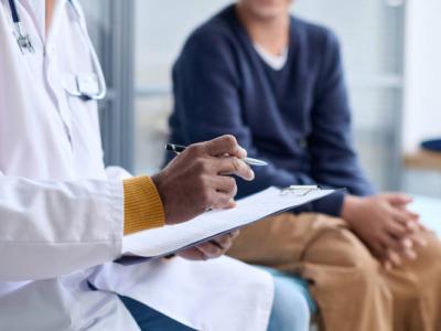 Man with doctor in clinic
