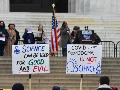 Anti-science signs at DC anti-mandate rally