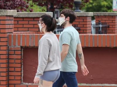 Couple wearing masks outside in Baltimore
