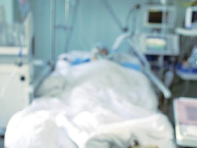 Patient in hospital bed - blurred photo