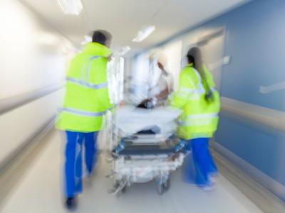 Blurry patient on gurney in hospital