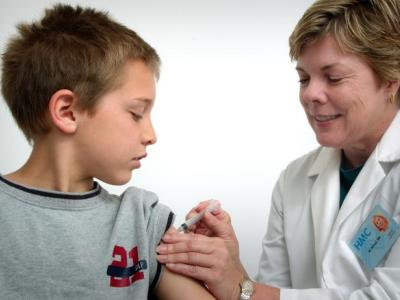 Boy getting flu shot