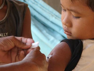 Boy receiving measles shot