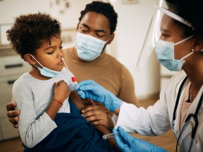 Boy getting PCR nasal swab