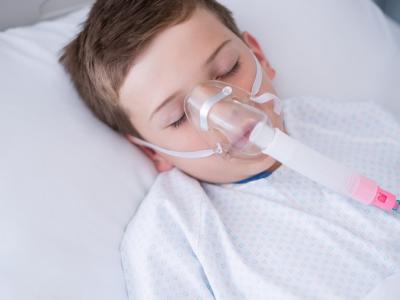 Boy in hospital on oxygen