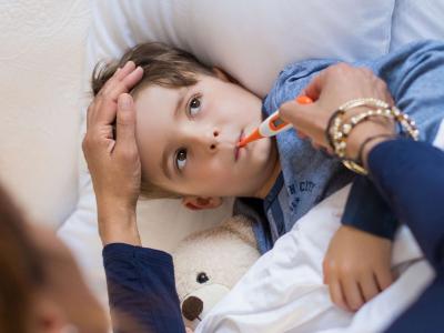 Boy with thermometer