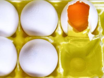 Broken egg in carton