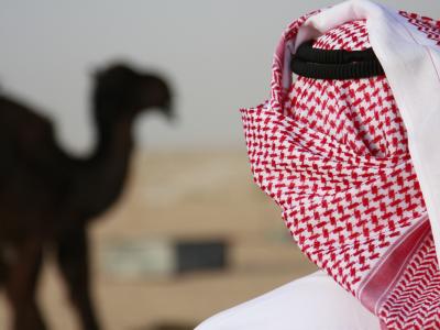 Saudi man and camel