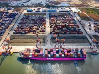 Cargo containers being loaded onto ship