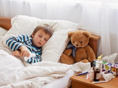 Sick boy in bed