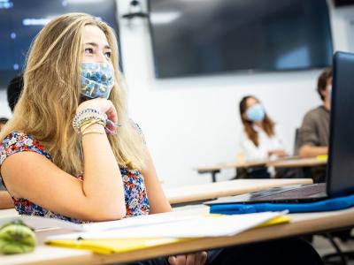 College student wearing mask