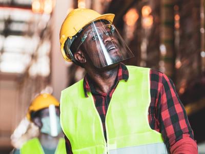 Construction workers in warehouse