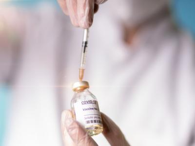 COVID vaccine vial and syringe