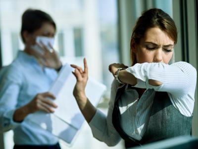 Coughing office worker