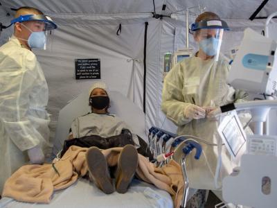 COVID-19 medical team with patient