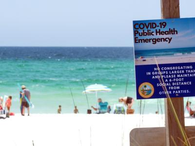 COVID-19 sign on Florida beach