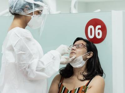 Woman getting COVID-19 swab test
