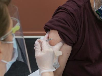 Man getting COVID vaccine