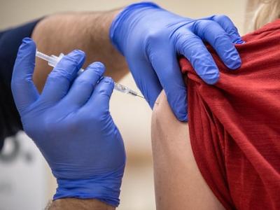 COVID vaccine in arm