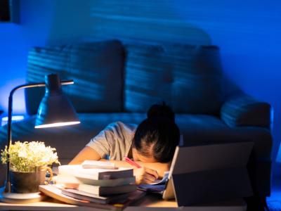 Student at laptop stressed out