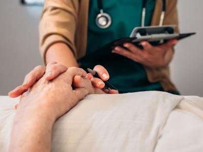 Doctor comforting patient