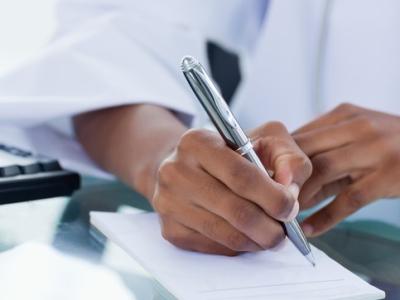 Doctor writing a prescription